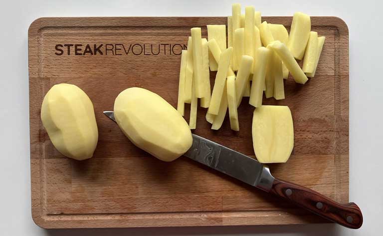 Peeled and sliced potatoes