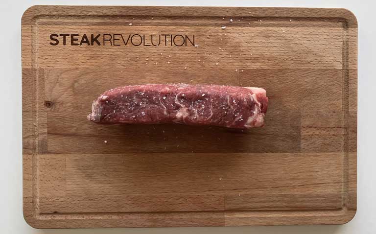 Salt the raw steak on the sides as well