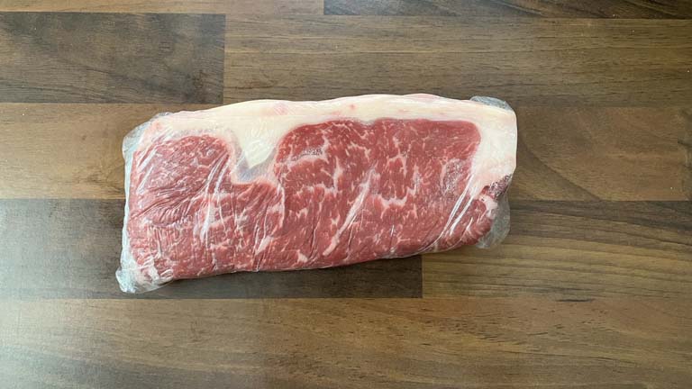 wrapping strip steak in foil - step 3