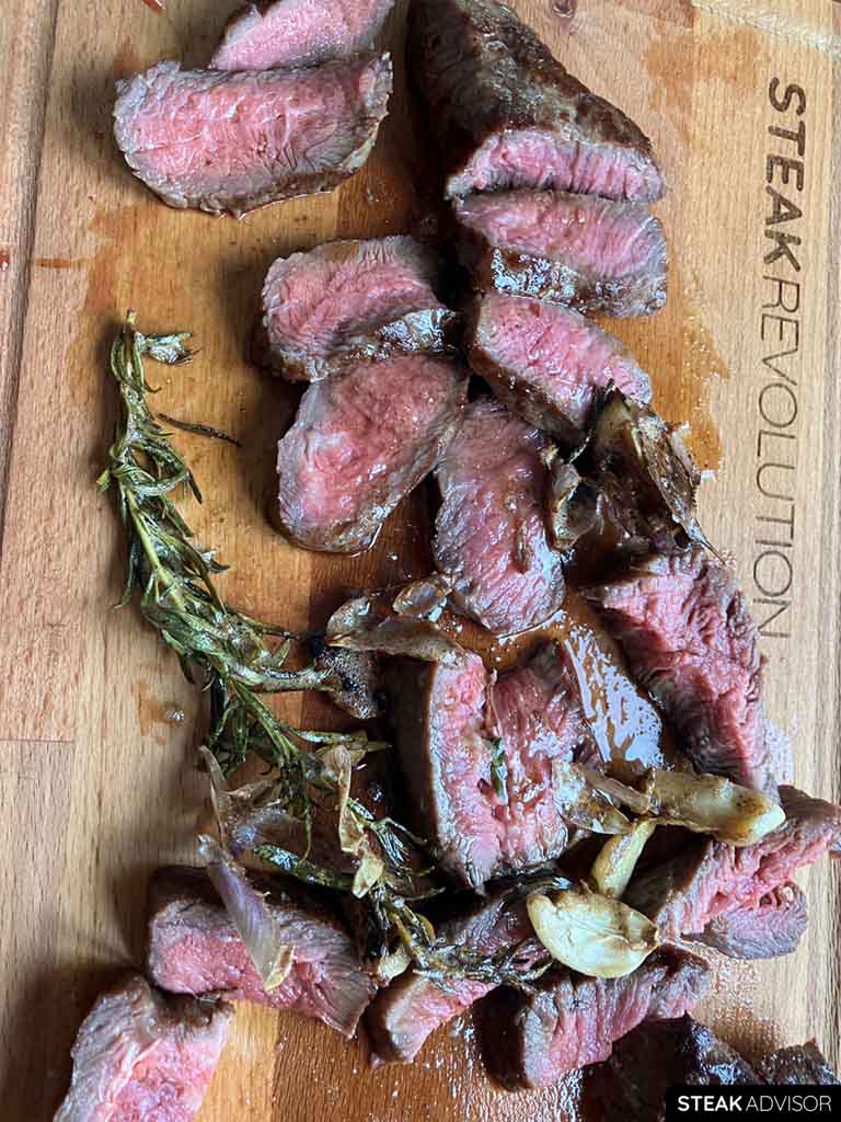 pan-seared flat iron steak; medium-rare doneness, vertical view